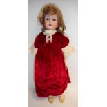 A German bisque head doll: impressed Germany .200.