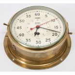 A brass cased bulkhead 'Astral' clock by Smiths:,