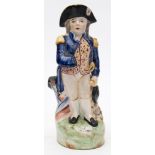 A Staffordshire pottery Nelson jug:, modelled standing in front of a cannon, 30.5cm high.