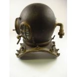 A 12-bolt diving helmet in the manner of Siebe Gorman & Co:,