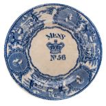 An Edwardian blue and white mess plate No 56 by Bovey Tracey Pottery Co Ltd:,