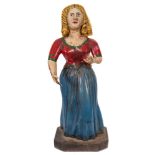 A carved and painted figurehead in the form of a woman:,