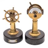 Two late 19th/early 20th century German 'nautical' cigar cutters:, one in the form of a helm,