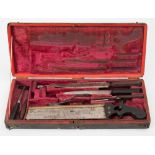 A 19th century part field surgical kit by Evans & Co,London:, including an ebony handled bone saw,