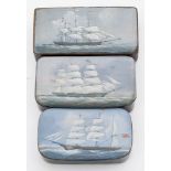 A group of three Victorian marine decorated black mache snuff boxes with ship portraits:,