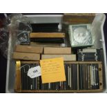 An accumulation of glass plate negatives and scientific diapositive 3 inch lantern slides:,