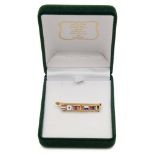 A 14ct gold and enamel Naval pennant brooch:, in the form of a flag pole with the signal 'Dearest',