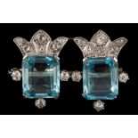 An aquamarine and diamond mounted bar brooch: each rectangular aquamarine approximately 12.