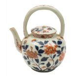 A Japanese Imari teapot and cover: with arched overhead handle,