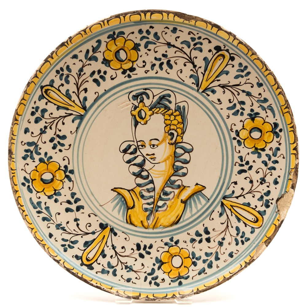 An Italian maiolica crespina: painted in blue,