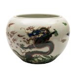 A large Chinese famille verte 'dragon' jardiniere: of globular form,