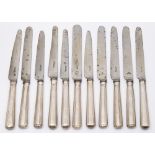 Eleven assorted Georgian silver handled thread pattern table knives,
