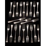 Twenty one Old English pattern table forks, various makers and dates: crested,