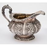 A William IV silver cream jug, maker John Whiting, London,