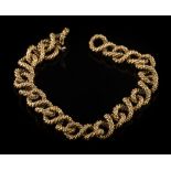 A 9ct gold bracelet: of rope textured figure of eight linking with matching integral clasp,