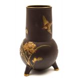 A Mintons Aesthetic movement tripod vase: decorated in the Japonesque manner imitating bronze