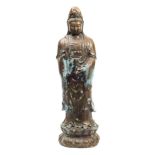 A large bronze figure of Guanyin: dressed in traditional robes and standing on a lotus flower, 75cm.