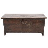 A 17th Century oak rectangular plank coffer:, of small size,