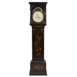 A lacquered longcase clock: the eight-day duration movement striking the hours on a bell,