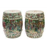 A pair of Canton famille rose porcelain barrel-shaped garden seats: each with reticulated coin