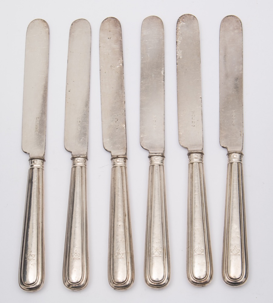 A set of six Victorian thread pattern silver handled dessert knives, maker Henry Harrison,