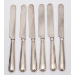 A set of six Victorian thread pattern silver handled dessert knives, maker Henry Harrison,