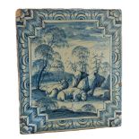 A Continental blue and white tin-glazed stove tile: painted with a ram and ewe in an extensive