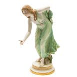 A Meissen porcelain figure of a lady bowler: modelled after the original by Walther Schott with a