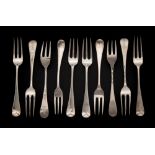 Ten assorted Hanoverian pattern dessert forks, various makers and dates, most marks worn: crested,