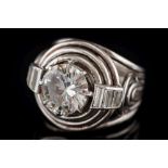 An art deco-style diamond solitaire ring: the circular old brilliant-cut diamond approximately 9.