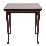A George II mahogany rectangular side table:, the moulded top with re-entrant corners,