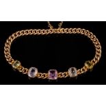 A multi coloured gem-set curb-link bracelet: with graduated cushion shaped gems in cut-down collect