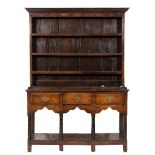An 18th Century oak dresser:, of comparatively small size,