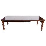 A Victorian mahogany extending dining table:, with a telescopic action,