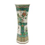 A Chinese famille verte octagonal vase: painted with panels in the form of three-fold screens