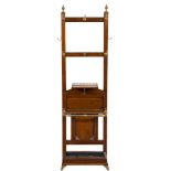 By Jas Shoolbred A late Victorian mahogany and brass mounted hall stand:,