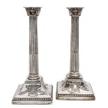 A pair of Victorian silver candlesticks, maker Rupert Favell, London,