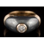 Cartier. A diamond and hematite ring: the central brilliant-cut diamond approximately 0.