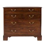 A George III mahogany rectangular chest:, the top with a moulded edge,