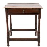 An early 18th Century oak rectangular side table:, the overhanging top with a moulded edge,