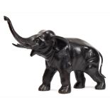 A large Japanese bronze model of an elephant: with raised trunk and open mouth, unsigned, 54cm.