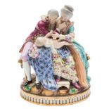 A Meissen family group 'The Lucky Parents': after the model by Michel Victor Acier,