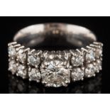 A diamond two-row cluster ring: with principal circular brilliant-cut diamond approximately 0.