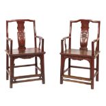 A pair of Chinese red lacquer armchairs:,