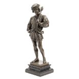 A 20th century bronze figure of a Renaissance page: holding a ceremonial mace over his left
