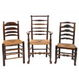 A set of four early 19th century elm and ash ladderback dining chairs:,