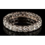 A diamond eternity ring: with twenty-two circular,