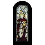 A 19th century stained glass panel, depicting Saint John the Apostle: of arched outline,