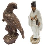 A Japanese Bizen stoneware figure of an eagle and a crackle glazed figure in the style of Makuzu