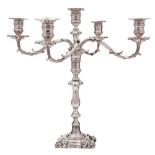 A Victorian silver plated four-branch candelabra,
